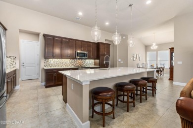 Welcome to this stunning estate home where this luxurious abode on Plantation Bay Golf and Country Club in Florida - for sale on GolfHomes.com, golf home, golf lot