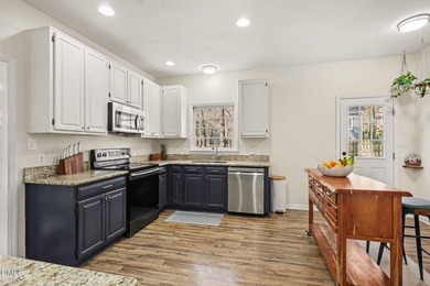 Located in the desirable Hedingham Golf Community, this inviting on Hedingham Golf and Athletic Club in North Carolina - for sale on GolfHomes.com, golf home, golf lot