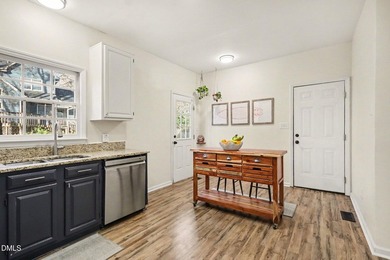 Located in the desirable Hedingham Golf Community, this inviting on Hedingham Golf and Athletic Club in North Carolina - for sale on GolfHomes.com, golf home, golf lot