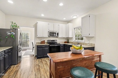 Located in the desirable Hedingham Golf Community, this inviting on Hedingham Golf and Athletic Club in North Carolina - for sale on GolfHomes.com, golf home, golf lot