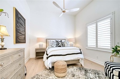 Nestled within the prestigious Pelican Marsh, this recently on Pelican Marsh Golf Club in Florida - for sale on GolfHomes.com, golf home, golf lot