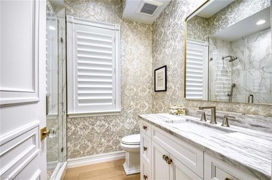 Nestled within the prestigious Pelican Marsh, this recently on Pelican Marsh Golf Club in Florida - for sale on GolfHomes.com, golf home, golf lot