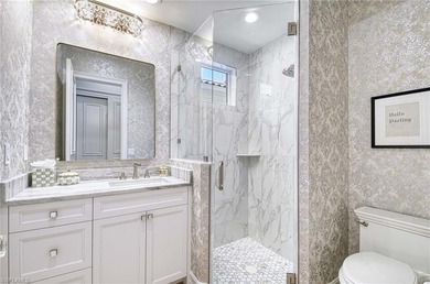 Nestled within the prestigious Pelican Marsh, this recently on Pelican Marsh Golf Club in Florida - for sale on GolfHomes.com, golf home, golf lot