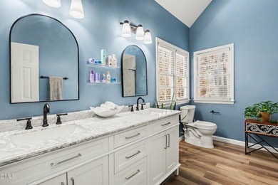 Located in the desirable Hedingham Golf Community, this inviting on Hedingham Golf and Athletic Club in North Carolina - for sale on GolfHomes.com, golf home, golf lot