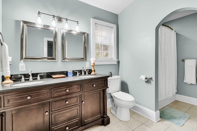 Nestled among the oak trees on this sought after street, this on Charleston Municipal Golf Course in South Carolina - for sale on GolfHomes.com, golf home, golf lot