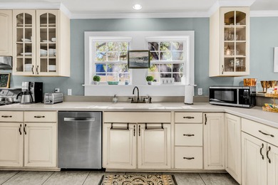 Nestled among the oak trees on this sought after street, this on Charleston Municipal Golf Course in South Carolina - for sale on GolfHomes.com, golf home, golf lot