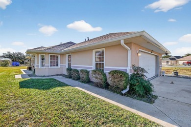 Welcome to this immaculate, light-filled lake view home nestled on Monarch At Royal Highlands in Florida - for sale on GolfHomes.com, golf home, golf lot