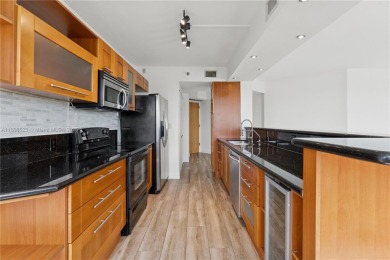 Spacious Corner Condo with Sunset Lake  Golf Views in the Heart on Turnberry Isle Resort and Club in Florida - for sale on GolfHomes.com, golf home, golf lot