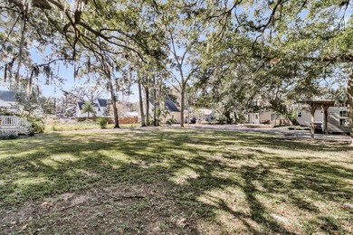Nestled among the oak trees on this sought after street, this on Charleston Municipal Golf Course in South Carolina - for sale on GolfHomes.com, golf home, golf lot