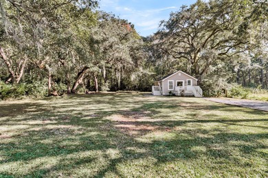 Nestled among the oak trees on this sought after street, this on Charleston Municipal Golf Course in South Carolina - for sale on GolfHomes.com, golf home, golf lot