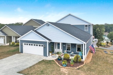 Enjoy this beautifully built home, nestled inside a quiet, gated on The Waterfront Country Club in Virginia - for sale on GolfHomes.com, golf home, golf lot