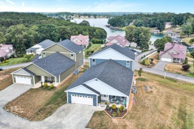 Enjoy this beautifully built home, nestled inside a quiet, gated on The Waterfront Country Club in Virginia - for sale on GolfHomes.com, golf home, golf lot