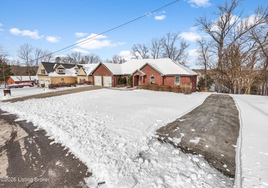 Welcome to 190 Strawberry Circle, a rare lakefront home for sale on Doe Valley Country Club in Kentucky - for sale on GolfHomes.com, golf home, golf lot