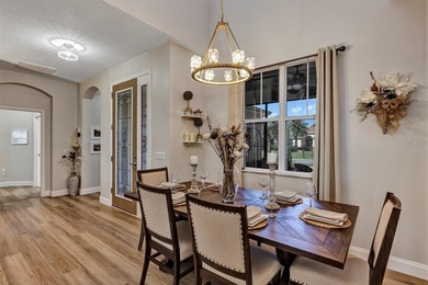 Golf Front 2 Bedroom, 2 bath w/ flex room and over-sized 2 car + on Arlington Ridge Golf Club in Florida - for sale on GolfHomes.com, golf home, golf lot