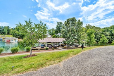 Enjoy this beautifully built home, nestled inside a quiet, gated on The Waterfront Country Club in Virginia - for sale on GolfHomes.com, golf home, golf lot