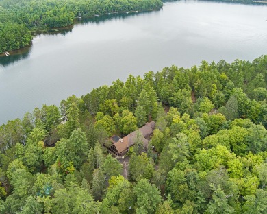 The nostalgic 3 season main lodge at the Froelich's Sayner Lodge on Plum Lake Golf Club in Wisconsin - for sale on GolfHomes.com, golf home, golf lot