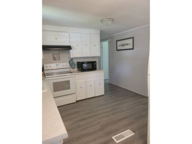 This beautifully maintained home exudes warmth and comfort from on Rolling Greens Executive Golf Community in Florida - for sale on GolfHomes.com, golf home, golf lot