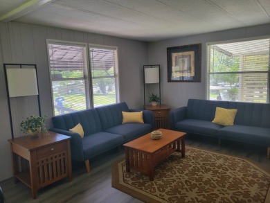 This beautifully maintained home exudes warmth and comfort from on Rolling Greens Executive Golf Community in Florida - for sale on GolfHomes.com, golf home, golf lot