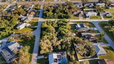 Seize this incredible opportunity to own a double lot in one of on Port Charlotte Golf Club in Florida - for sale on GolfHomes.com, golf home, golf lot