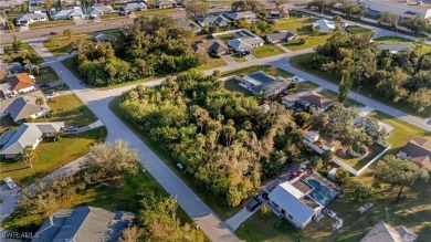 Seize this incredible opportunity to own a double lot in one of on Port Charlotte Golf Club in Florida - for sale on GolfHomes.com, golf home, golf lot