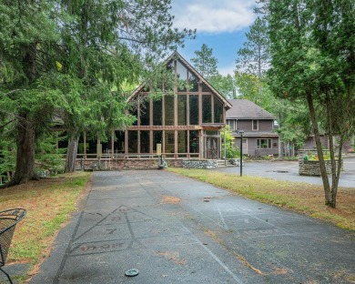 The nostalgic 3 season main lodge at the Froelich's Sayner Lodge on Plum Lake Golf Club in Wisconsin - for sale on GolfHomes.com, golf home, golf lot