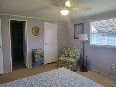 This beautifully maintained home exudes warmth and comfort from on Rolling Greens Executive Golf Community in Florida - for sale on GolfHomes.com, golf home, golf lot