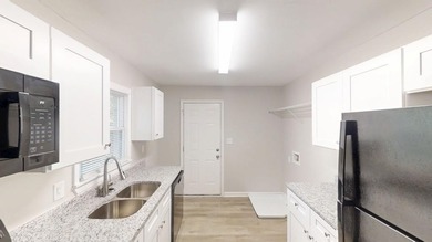 Welcome to this beautifully updated 3-bedroom, 1-bath ranch on Browns Mill Golf Course in Georgia - for sale on GolfHomes.com, golf home, golf lot