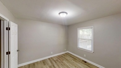 Welcome to this beautifully updated 3-bedroom, 1-bath ranch on Browns Mill Golf Course in Georgia - for sale on GolfHomes.com, golf home, golf lot