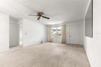 This spacious villa is located in the much sought after 55+ on On Top of the World Golf Course in Florida - for sale on GolfHomes.com, golf home, golf lot