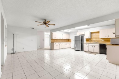 This spacious villa is located in the much sought after 55+ on On Top of the World Golf Course in Florida - for sale on GolfHomes.com, golf home, golf lot