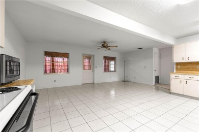 This spacious villa is located in the much sought after 55+ on On Top of the World Golf Course in Florida - for sale on GolfHomes.com, golf home, golf lot