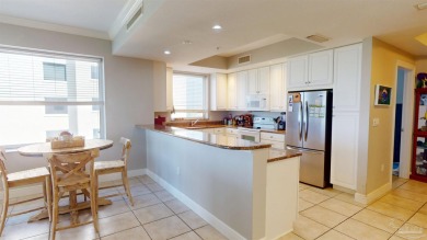 This end-unit residence in the sought-after Santo Amaro Building on Lost Key Golf Club in Florida - for sale on GolfHomes.com, golf home, golf lot