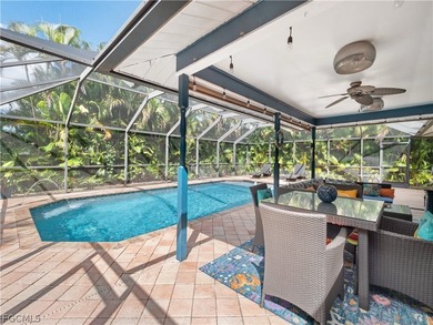 Welcome to your own private oasis! This charming 3-bedroom on Palmetto-Pine Country Club in Florida - for sale on GolfHomes.com, golf home, golf lot