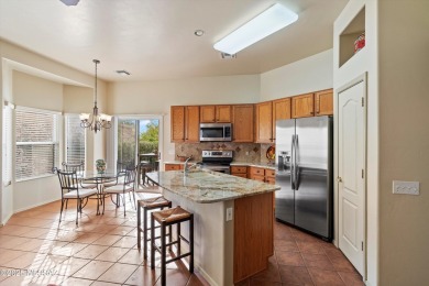 Bright and inviting 2-bedroom, 2-bathroom home with a den on Heritage Highlands At Dove Mountain in Arizona - for sale on GolfHomes.com, golf home, golf lot