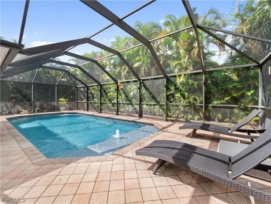 Welcome to your own private oasis! This charming 3-bedroom on Palmetto-Pine Country Club in Florida - for sale on GolfHomes.com, golf home, golf lot