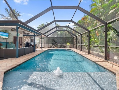 Welcome to your own private oasis! This charming 3-bedroom on Palmetto-Pine Country Club in Florida - for sale on GolfHomes.com, golf home, golf lot