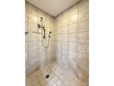 This end-unit residence in the sought-after Santo Amaro Building on Lost Key Golf Club in Florida - for sale on GolfHomes.com, golf home, golf lot