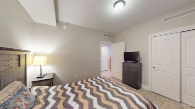 This end-unit residence in the sought-after Santo Amaro Building on Lost Key Golf Club in Florida - for sale on GolfHomes.com, golf home, golf lot