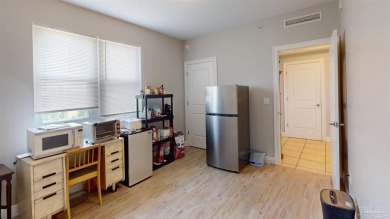 This end-unit residence in the sought-after Santo Amaro Building on Lost Key Golf Club in Florida - for sale on GolfHomes.com, golf home, golf lot