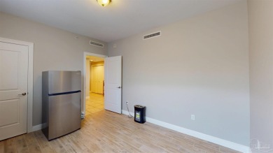 This end-unit residence in the sought-after Santo Amaro Building on Lost Key Golf Club in Florida - for sale on GolfHomes.com, golf home, golf lot