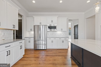 AMAZING OPPORTUNITY WITH RECENT PRICE IMPROVEMENT AND MOTIVATED on Traditions of Braselton Golf Club in Georgia - for sale on GolfHomes.com, golf home, golf lot