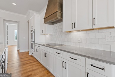 AMAZING OPPORTUNITY WITH RECENT PRICE IMPROVEMENT AND MOTIVATED on Traditions of Braselton Golf Club in Georgia - for sale on GolfHomes.com, golf home, golf lot