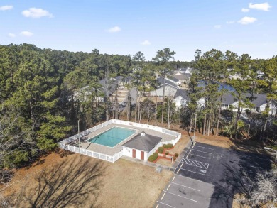 Nestled in the serene golf course community of Colonial Charters on Palmetto Greens Golf and Country Club in South Carolina - for sale on GolfHomes.com, golf home, golf lot