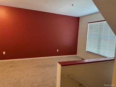 This Beautiful, Move-In-Ready Colonial Townhouse features many on Evergreen Hills Golf Course in Michigan - for sale on GolfHomes.com, golf home, golf lot