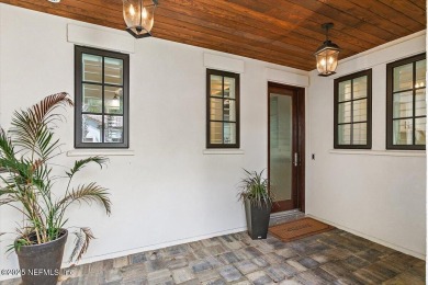 Experience waterfront living at its finest in this elegant on Pablo Creek Club in Florida - for sale on GolfHomes.com, golf home, golf lot
