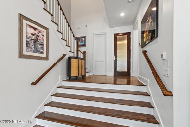 Experience waterfront living at its finest in this elegant on Pablo Creek Club in Florida - for sale on GolfHomes.com, golf home, golf lot