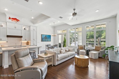 Experience waterfront living at its finest in this elegant on Pablo Creek Club in Florida - for sale on GolfHomes.com, golf home, golf lot