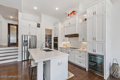Experience waterfront living at its finest in this elegant on Pablo Creek Club in Florida - for sale on GolfHomes.com, golf home, golf lot
