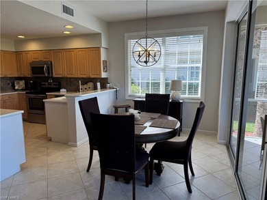 Welcome to this beautifully maintained first-floor end-unit on Crown Colony Golf and Country Club in Florida - for sale on GolfHomes.com, golf home, golf lot