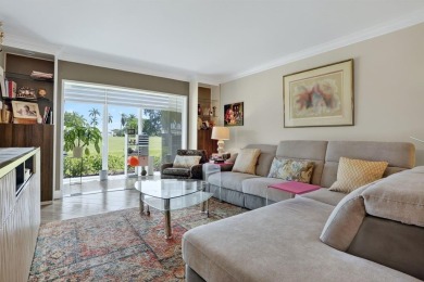 EXQUISITE 1ST FLOOR CORNER IN SOUGHT AFTER ARUBA VILLAGE ON THE on Wynmoor Golf Course in Florida - for sale on GolfHomes.com, golf home, golf lot